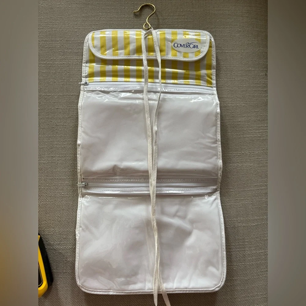 Vintage 1980s Covergirl Hanging Makeup Organizer. White and yellow stripe